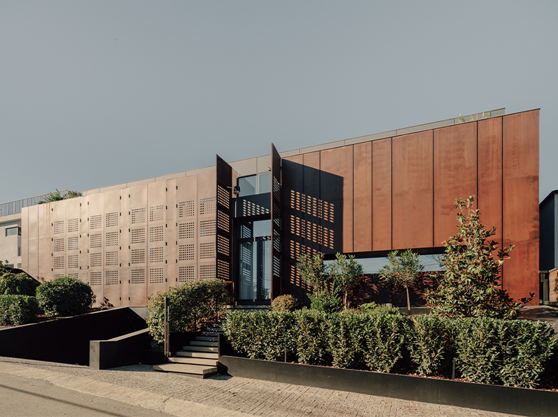 punctured iron doors shape kinetic facade by TIMM architecture in tbilisi - 1