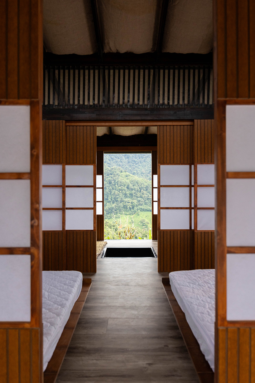 dark timber planks enfold retreat by baquio arquitectura within ecuador's chocó forest