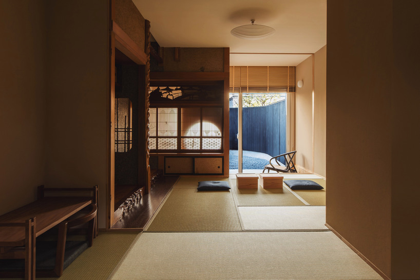 old japanese farmhouse transforms into modest hotel with U-shaped gardens