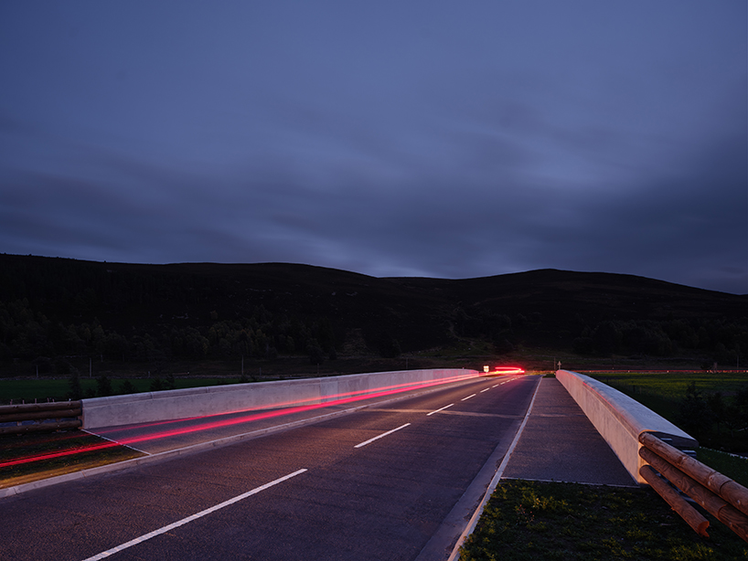 moxon's new granite and steel bridge in rural scotland stands alongside historic crossing