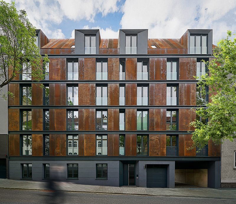 corten steel extends former laundry complex&rsquo;s brick buildings in kassel