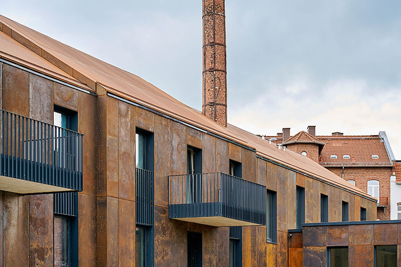 corten steel extends former laundry complex&rsquo;s brick buildings in kassel