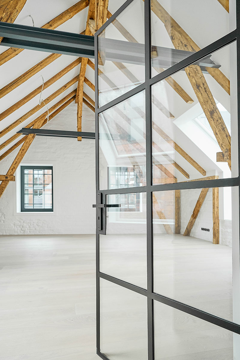 corten steel extends former laundry complex&rsquo;s brick buildings in kassel