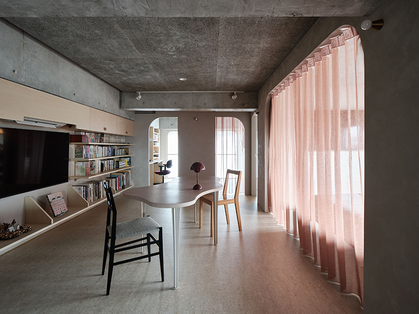 internal system of partitions and openings revives apartment in tokyo's suburbs