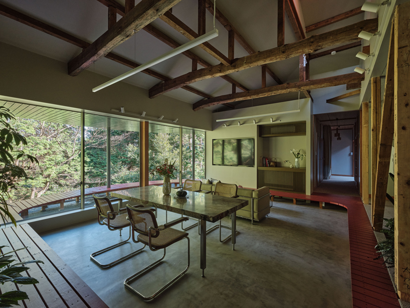 elevated circular veranda and canopy wrap 60-year-old restored japanese house