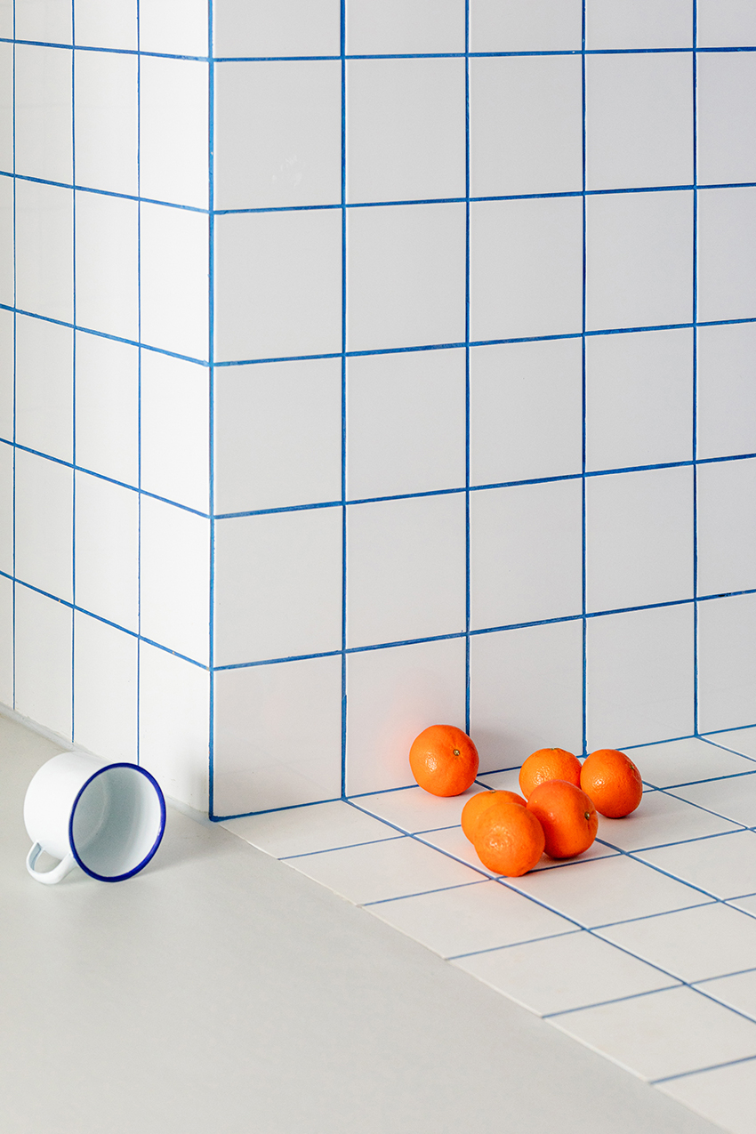 blue and white interiors link renovated 1930s apartment to its seaside setting in spain