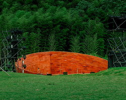 SODA architects plants bamboo stage installation amid mountains for qingshan art season