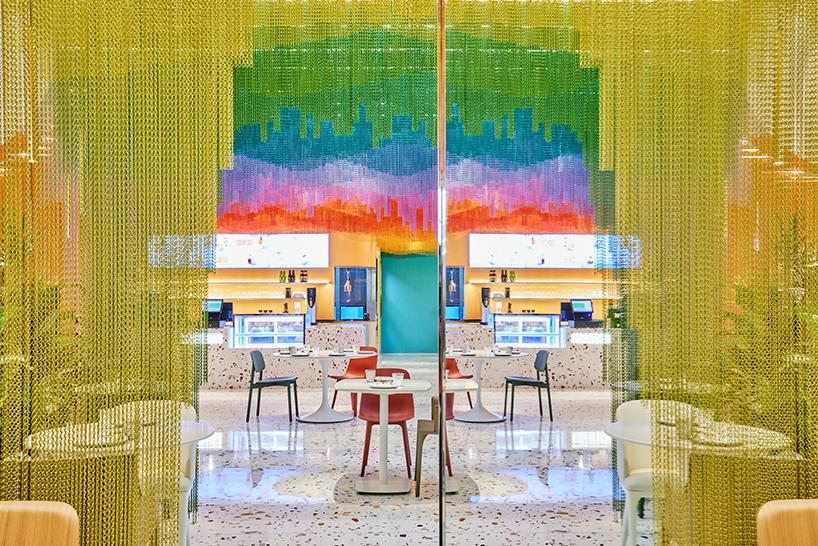 dine under a rippling rainbow at SODA architects restaurant in beijing