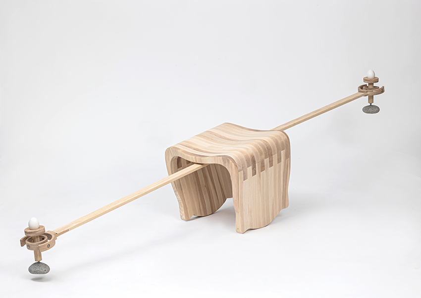 ahn kihyun’s playful performative chair is intersected by a gimbal structure to balances eggs