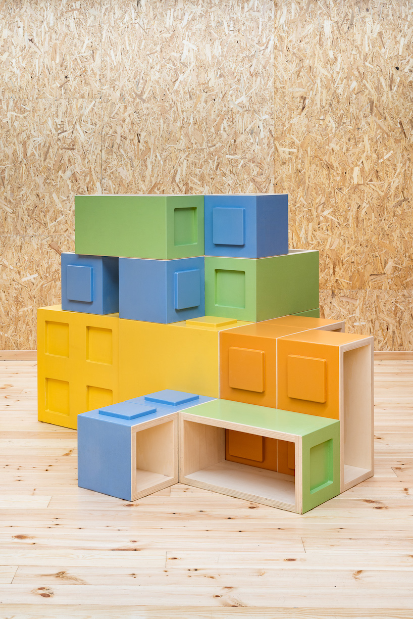 modular furniture pieces assemble to form varying play scenarios within lisbon-based school