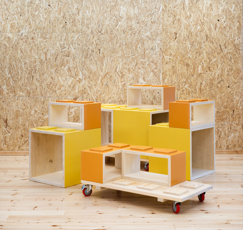 modular furniture pieces assemble to form varying play scenarios within lisbon-based school