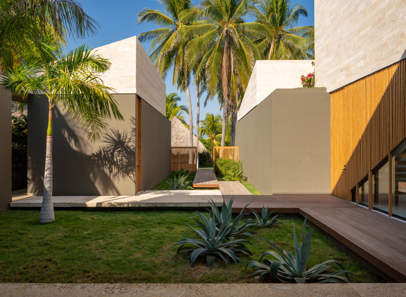 straw roof crowns coral house by elástica studio on el salvador's seaside