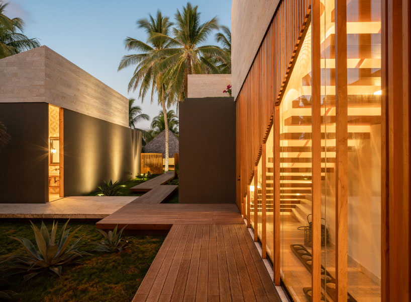 straw roof crowns coral house by elástica studio on el salvador's seaside