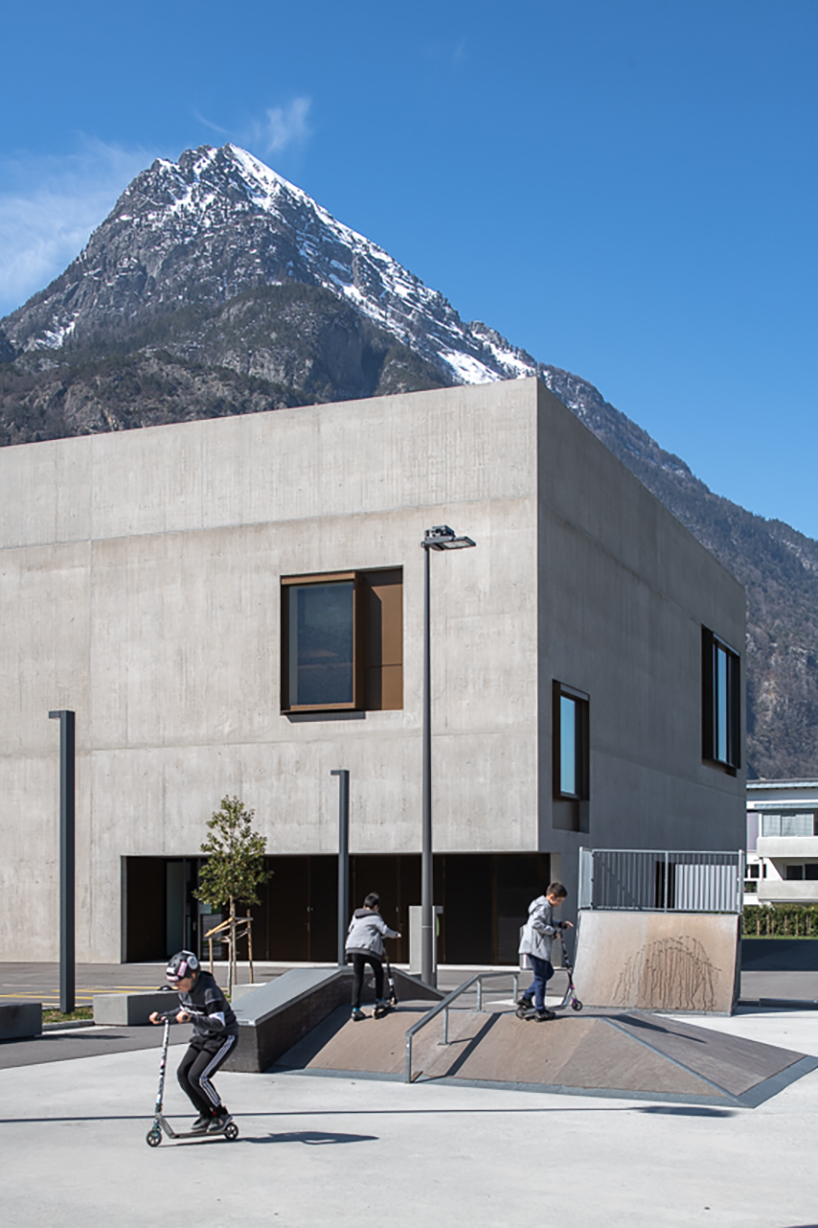 monolithic concrete volume houses sports hall in vernayaz of switzerland