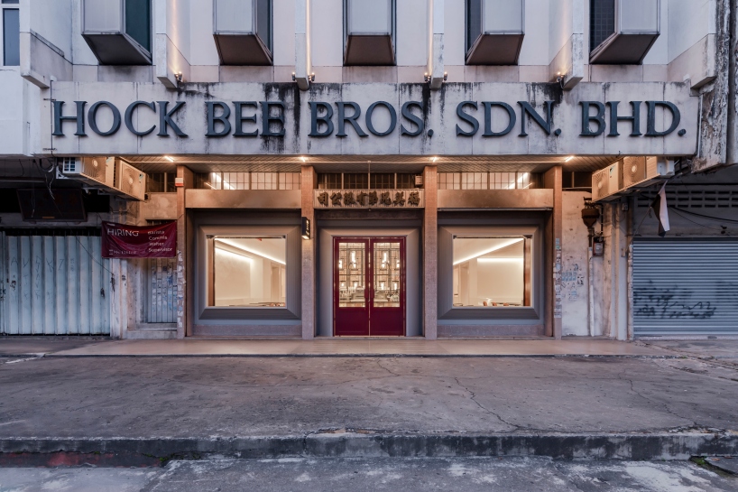 jujurwork revives malaysian heritage building as cafe with repurposed onyx installation
