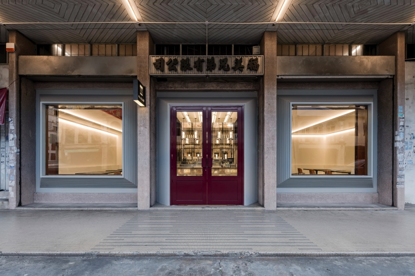 jujurwork revives malaysian heritage building as cafe with repurposed onyx installation