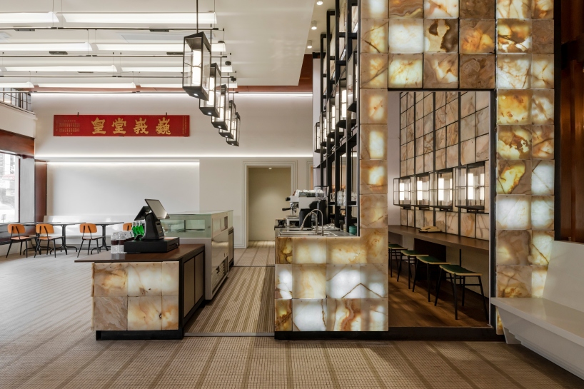 jujurwork revives malaysian heritage building as cafe with repurposed onyx installation