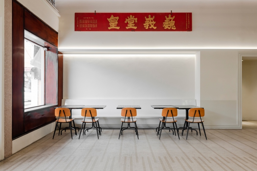 jujurwork revives malaysian heritage building as cafe with repurposed onyx installation