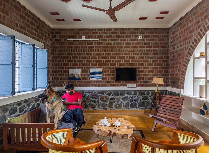 onebulb architecture's red fort brick house tucks into compact plot in india