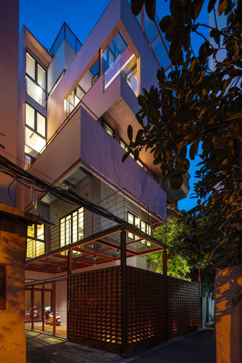 TOOB studio stacks pink open blocks reviving terraced residence in vietnam