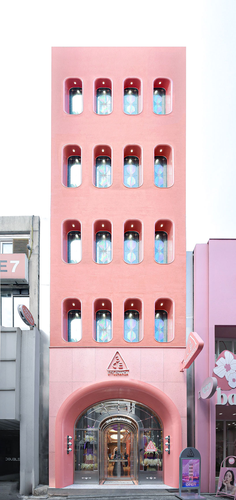 xsxl imagines seoul store as futuristic pink spacecraft with chromatic finishes and kinetic plants