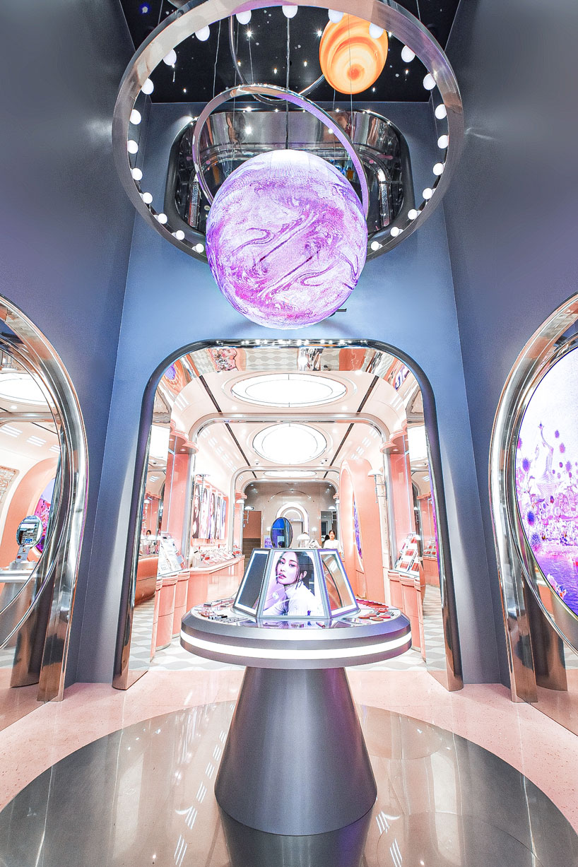 xsxl imagines seoul store as futuristic pink spacecraft with chromatic finishes and kinetic plants