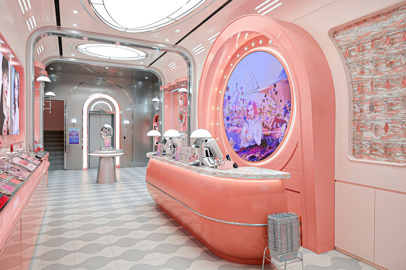 xsxl imagines seoul store as futuristic pink spacecraft with chromatic finishes and kinetic plants