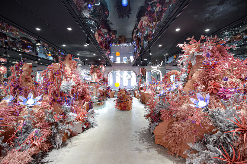 xsxl imagines seoul store as futuristic pink spacecraft with chromatic finishes and kinetic plants