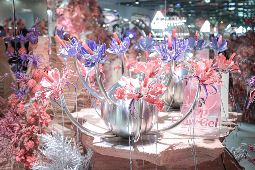 xsxl imagines seoul store as futuristic pink spacecraft with chromatic finishes and kinetic plants