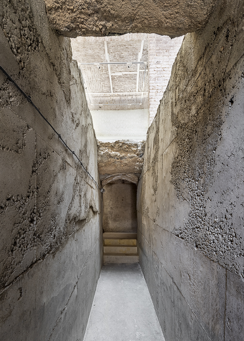 sculptural steel staircase and wall breathes new life into iranian poet&rsquo;s 1970s home