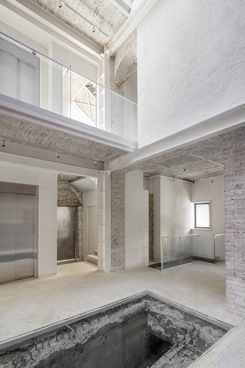 sculptural steel staircase and wall breathes new life into iranian poet&rsquo;s 1970s home