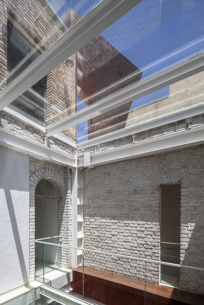 sculptural steel staircase and wall breathes new life into iranian poet&rsquo;s 1970s home