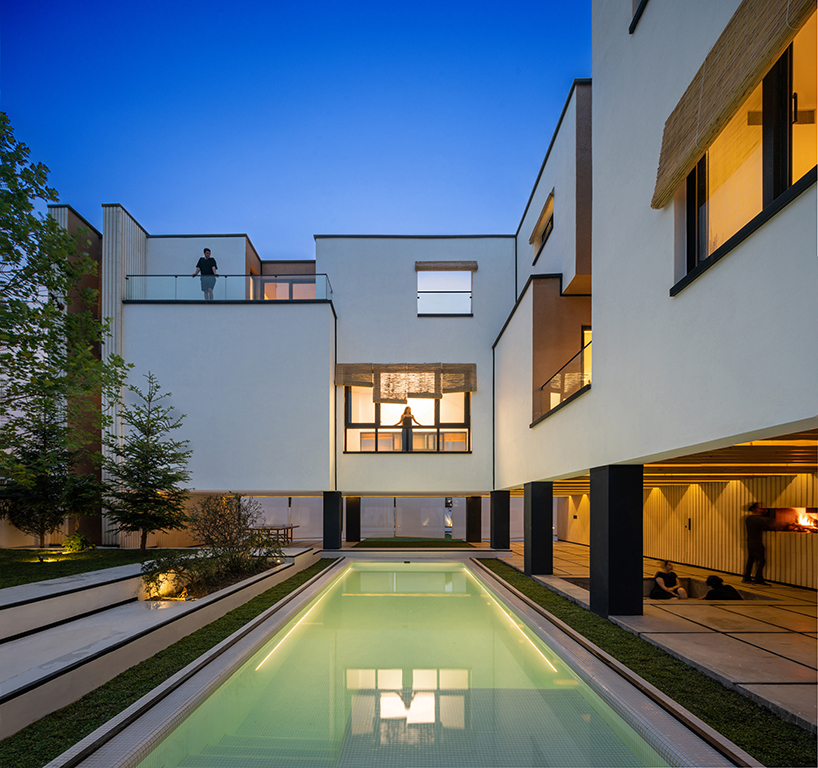 long white curtains cover samon villa's entire open facade in northern iran