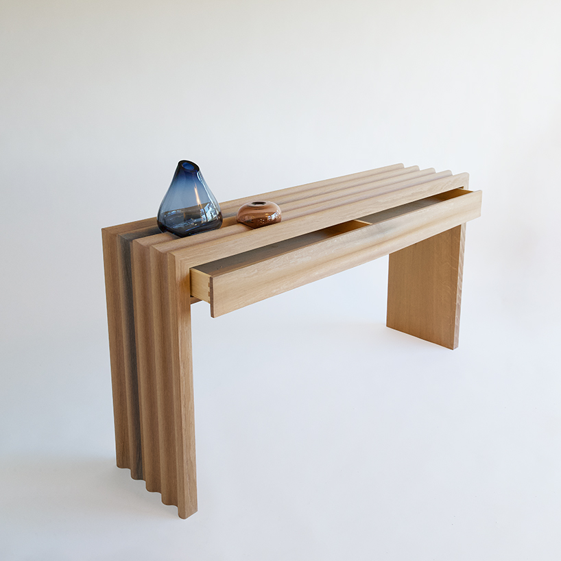 lisa sacco's corrugated oak console organically integrates blown glass accessories