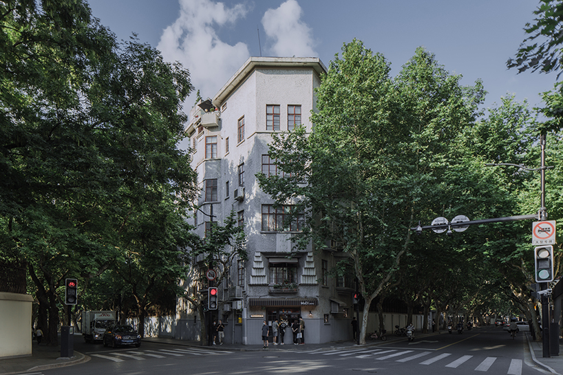 yang chen's photographic series captures twelve art deco buildings across shanghai