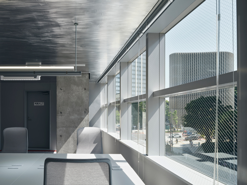 reflective aluminum evokes dynamic motion effects within manga studio in tokyo