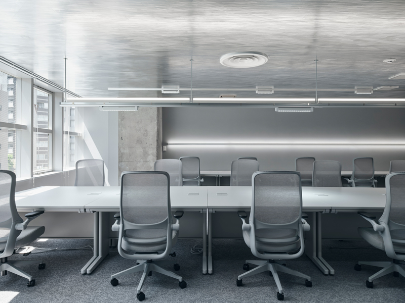 reflective aluminum evokes dynamic motion effects within manga studio in tokyo