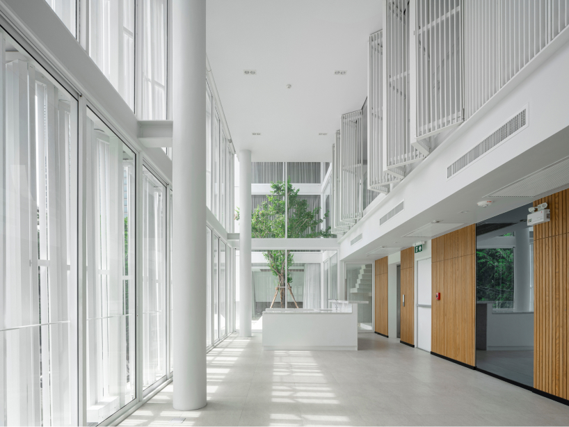 zigzag curtain wall enfolds silom residence's living units in bangkok
