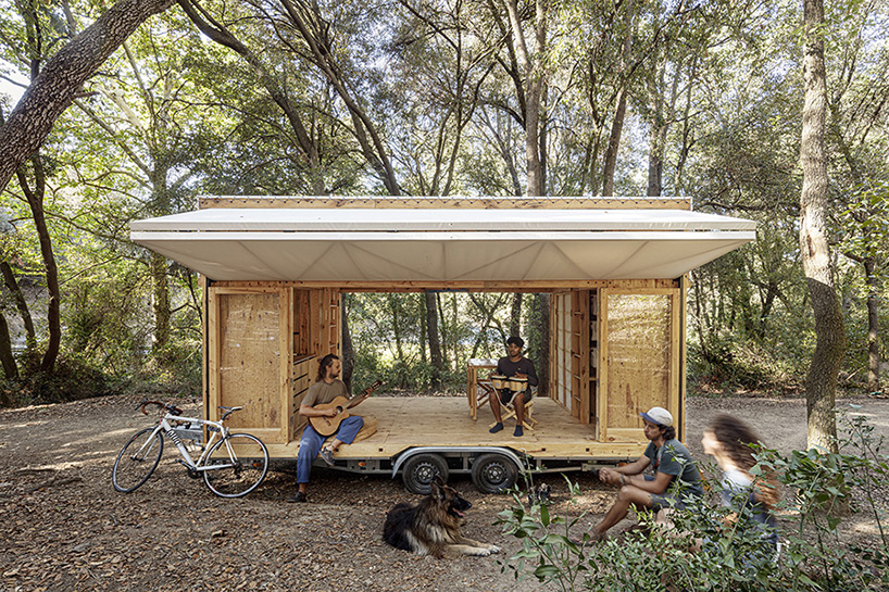 self-sufficient mobile home made of dowel-laminated timber rides on wheels