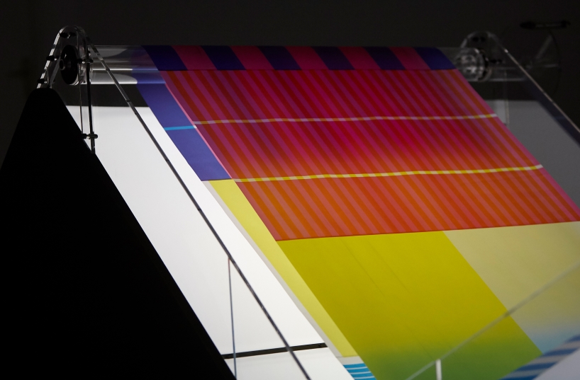 cyan magenta yellow installation by undo-redo nods to scottish tartan and bruno munari's unreadable books