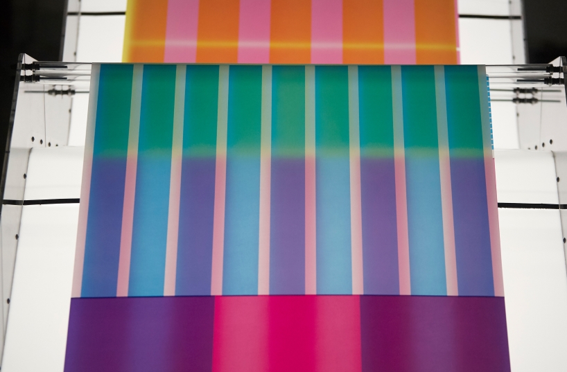 cyan magenta yellow installation by undo-redo nods to scottish tartan and bruno munari's unreadable books