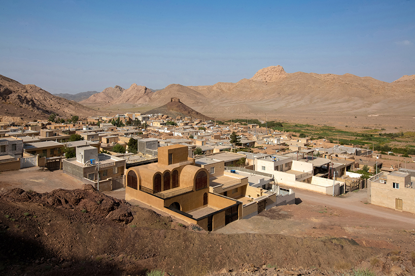 curved roofs root hypertext architecture studio's adobe house amid mountains of iran