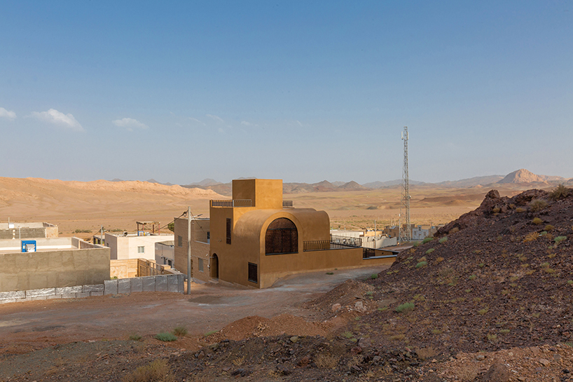 curved roofs root hypertext architecture studio's adobe house amid mountains of iran