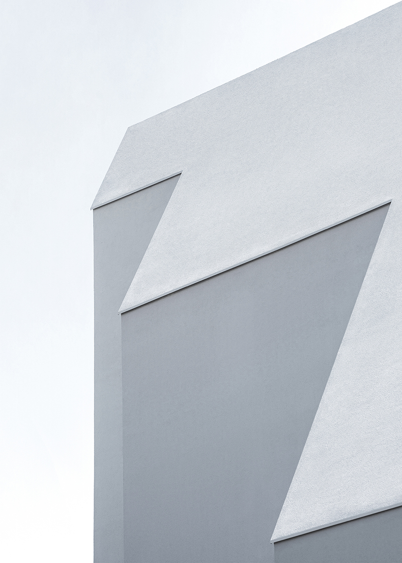 09A's white gabled house shifts perceptions of the familiar in south korean neighborhood