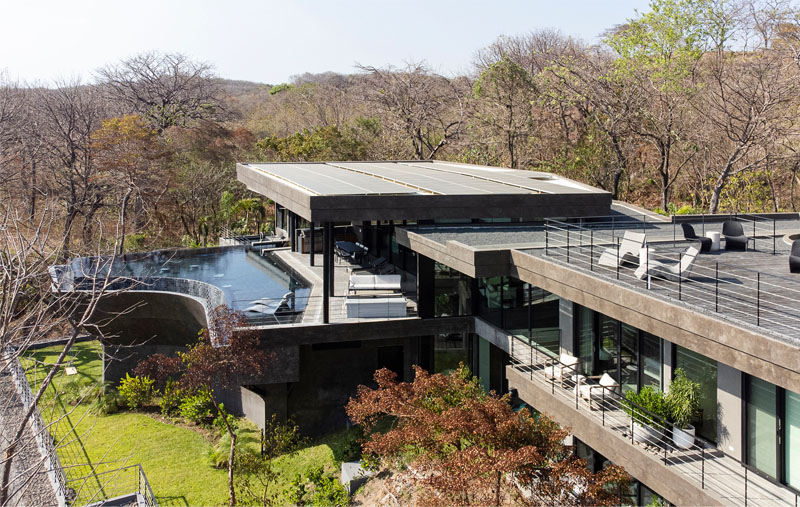 LSD architects gently hangs concrete casa vid e higurea over cliff in costa rica