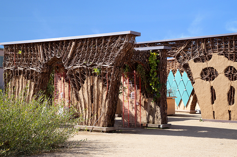 regrow willow poses hybrid earth construction system strengthened with digital fabrication