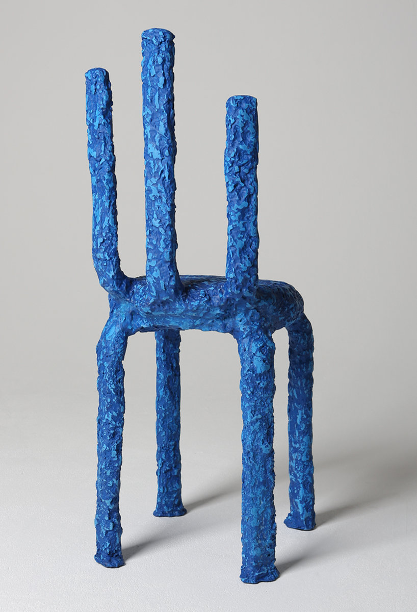 junmyung song fashions discarded sawdust into pulverized chairs