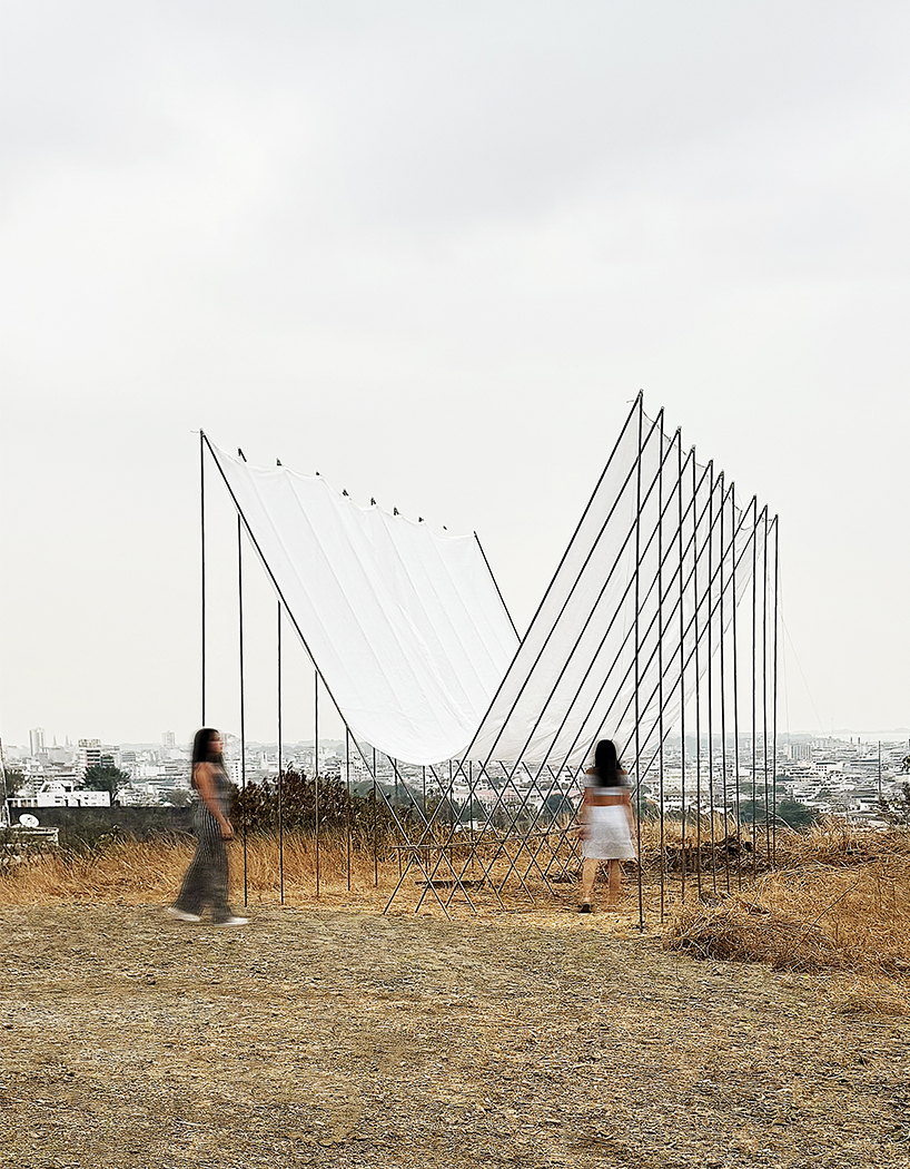 translucent fabric binds horizon pavilion's arrayed metal frame atop of ecuador hillside