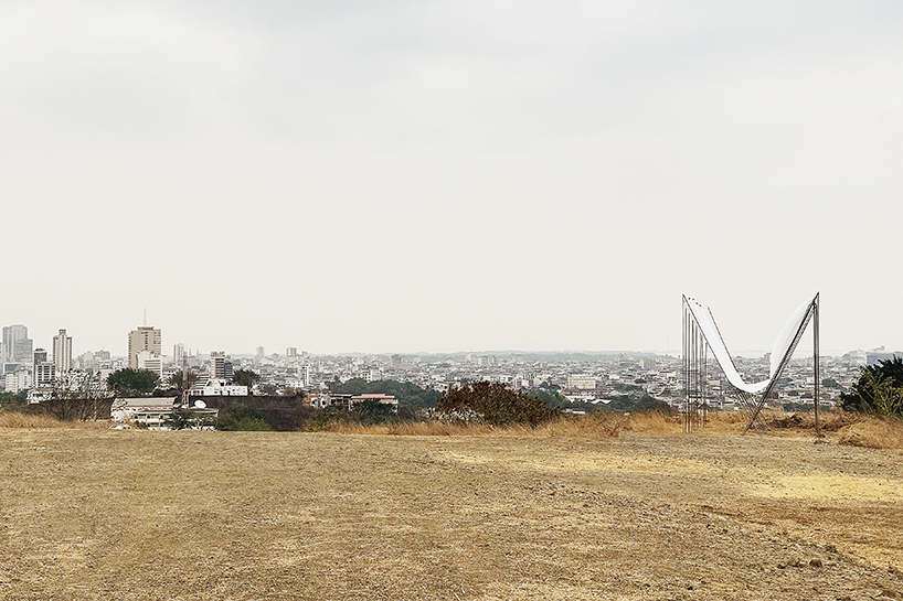translucent fabric binds horizon pavilion's arrayed metal frame atop of ecuador hillside