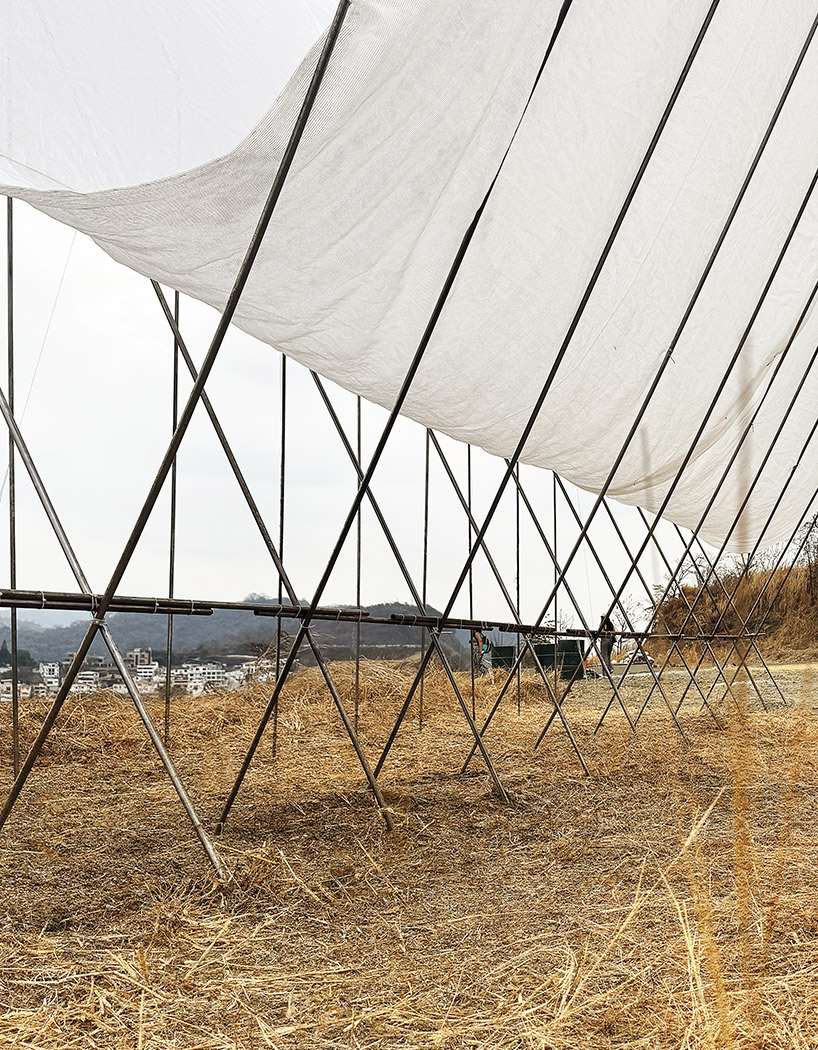 translucent fabric binds horizon pavilion's arrayed metal frame atop of ecuador hillside